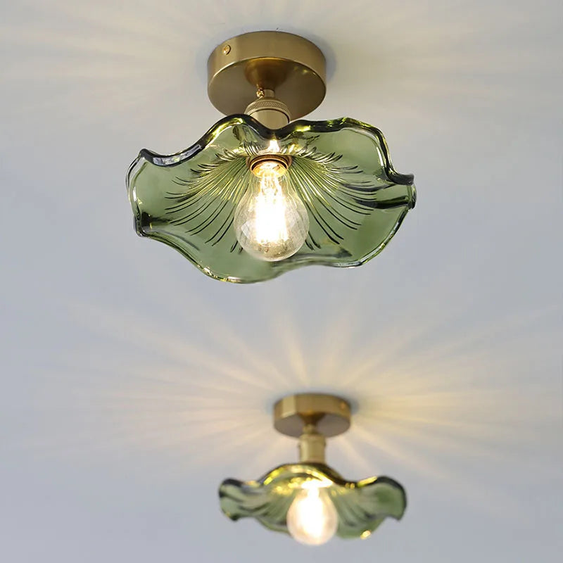 A single-head green lotus and leaf pendant lamp in the bedroom, dining room, bar counter and entrance hall of the homestay with