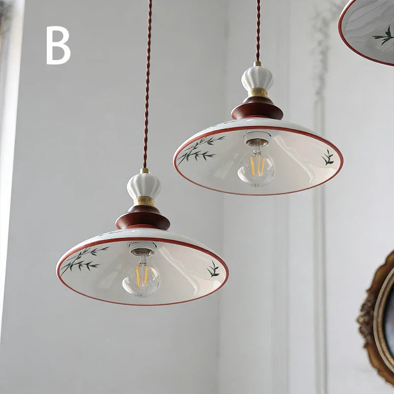 Retro medieval-style hand-painted small flower-patterned ceramic pendant lights for the cream-colored French-style restaurant en